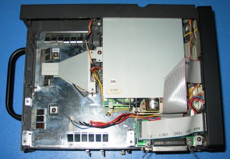 The old PSU is gone. Loose wires were cut from inside the PSU